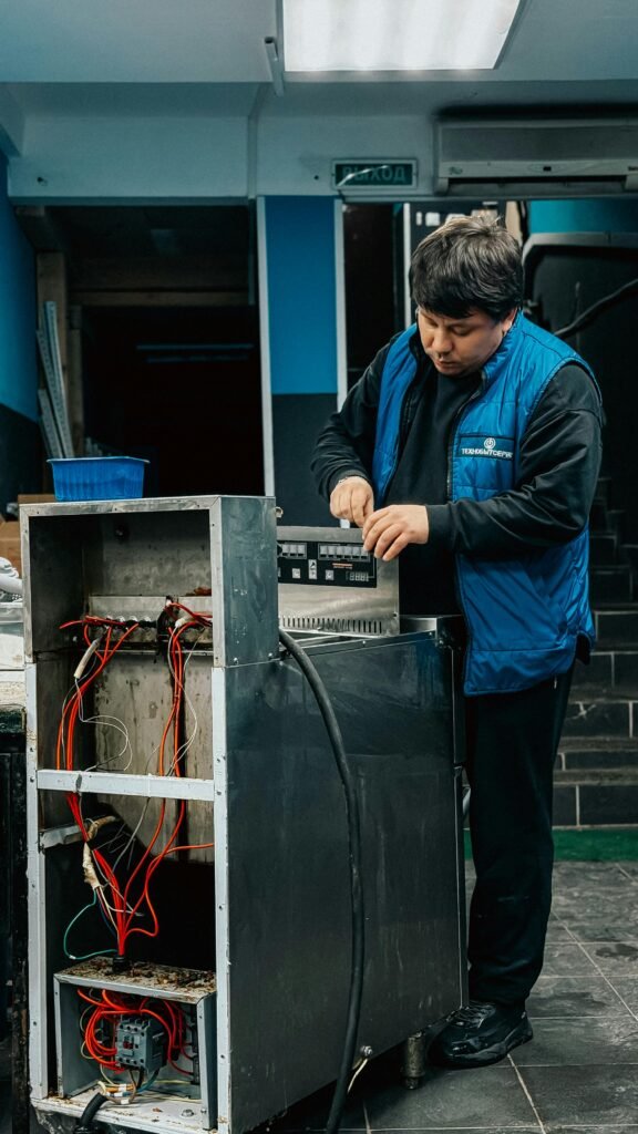 Technician repairing a commercial freezer in Colorado Springs